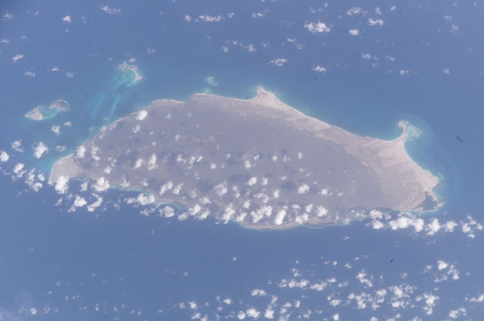 La Tortuga photographed from the International Space Station, ringed by reefs